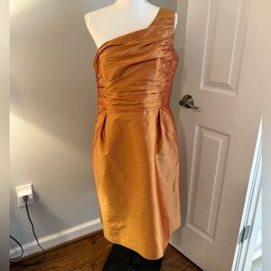 Coren Moore one shoulder apricot/irange/gold color cocktail dress. silk size 16